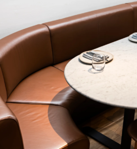 Infinity Constructions hospitality project – Nomad Sydney's kitchen seamlessly integrated into dining space