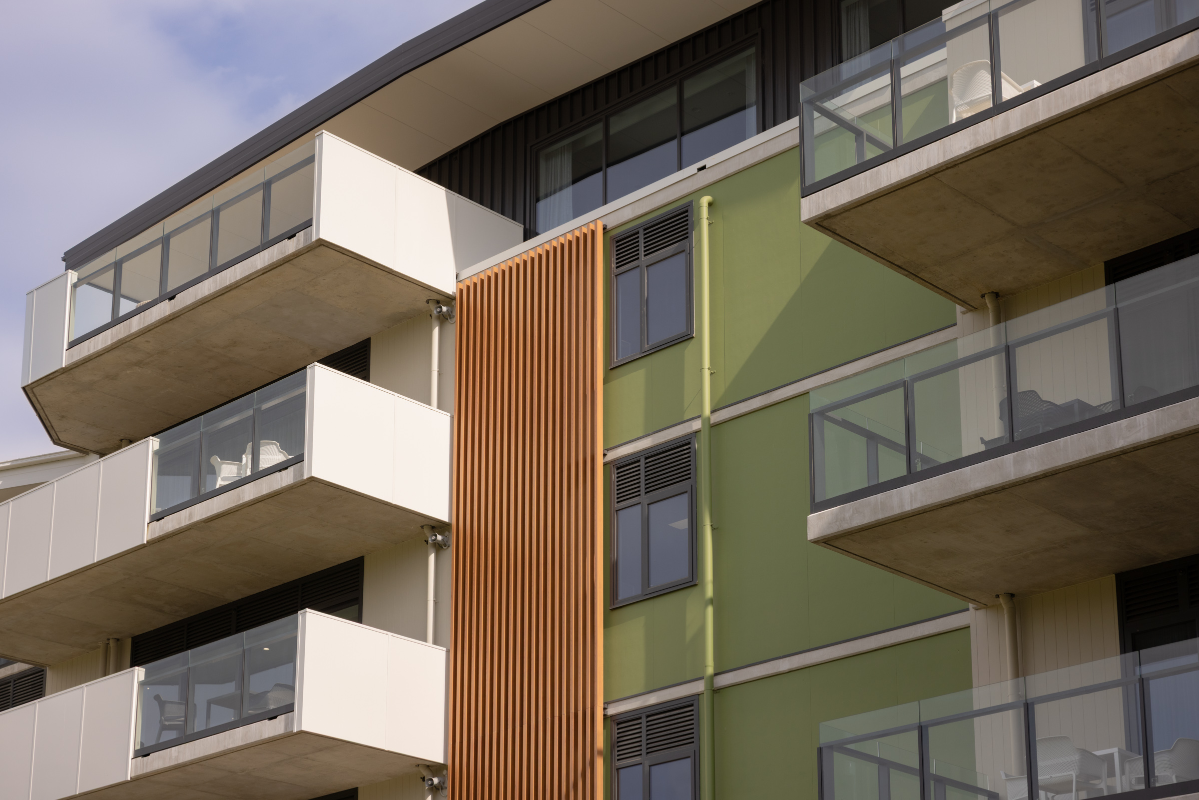 Balconies, green façade and timber screening at Infin8 Care Knoxfield