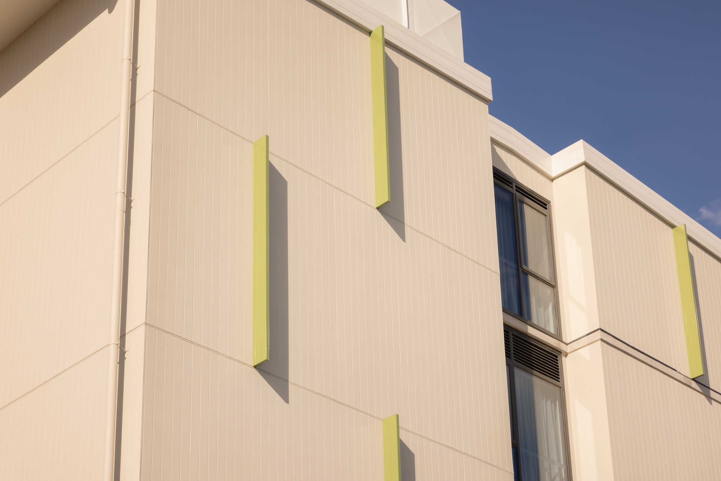 Exterior cladding and green architectural accents at Infin8 Care Knoxfield
