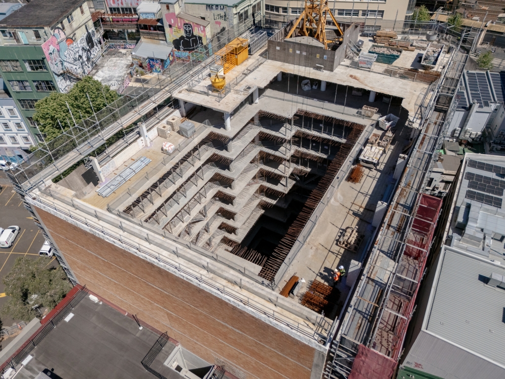 Aerial drone photo showing adaptive reuse construction progress by Infinity Constructions