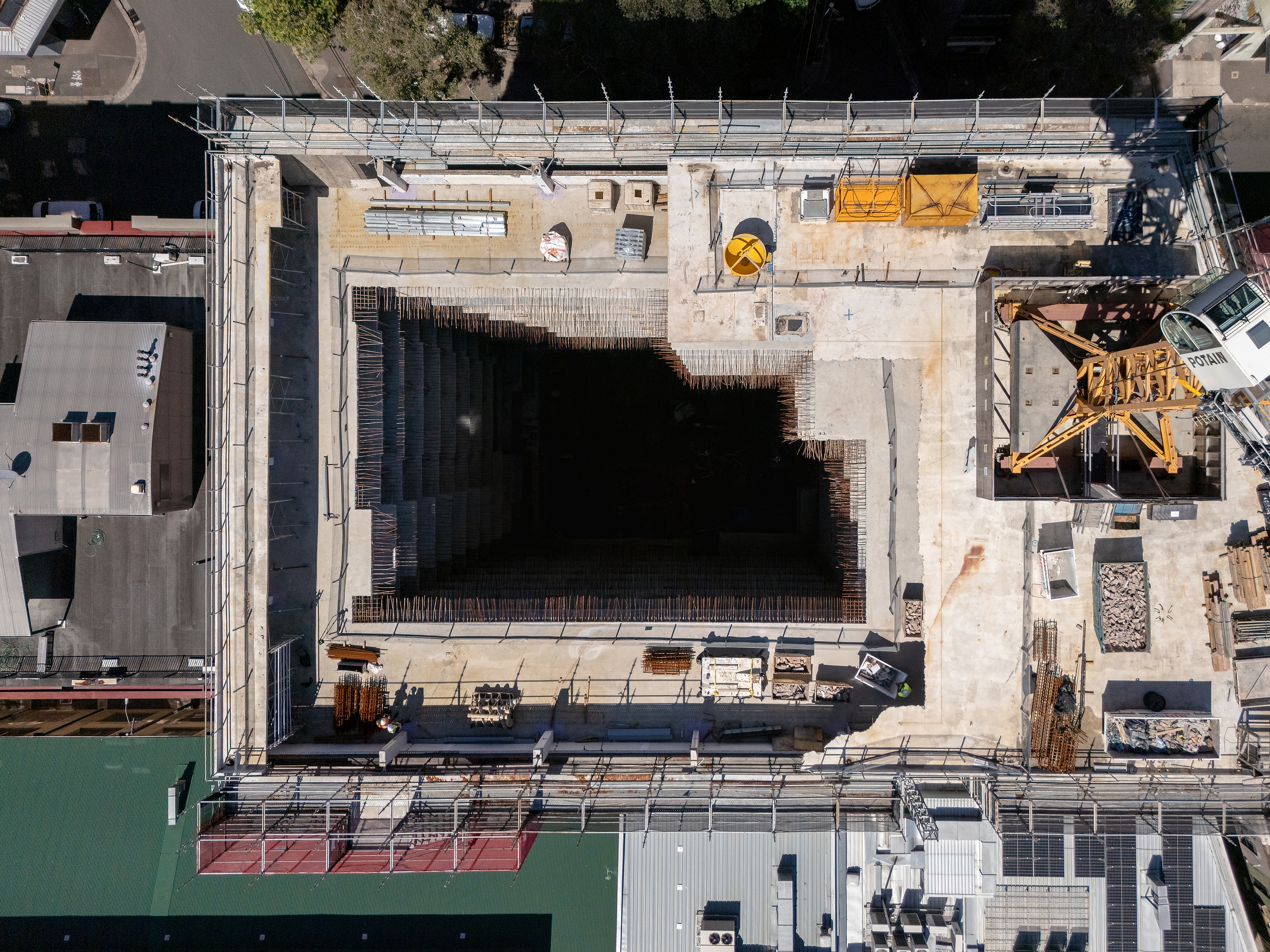 Top down drone view highlighting façade retention and demolition zone