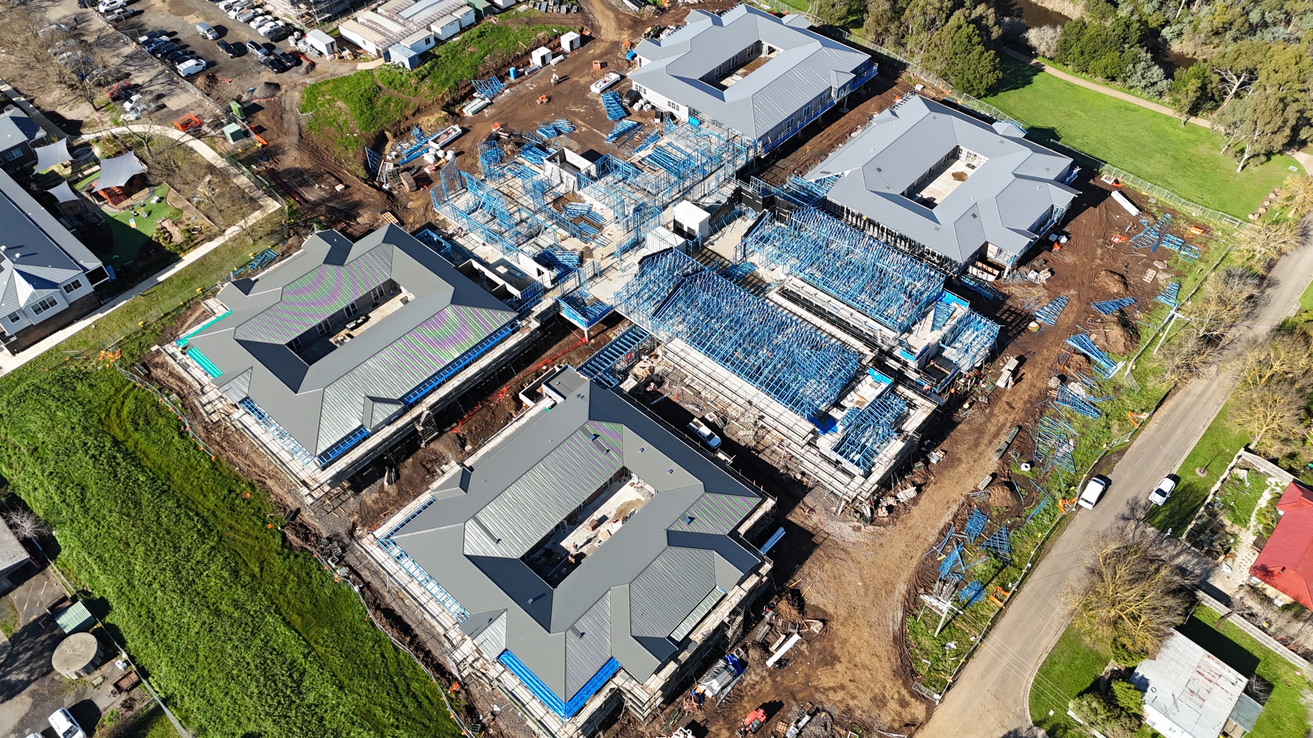 Wide aerial overview of the Embracia Aged Care Kyneton project within the surrounding regional Victorian landscape.