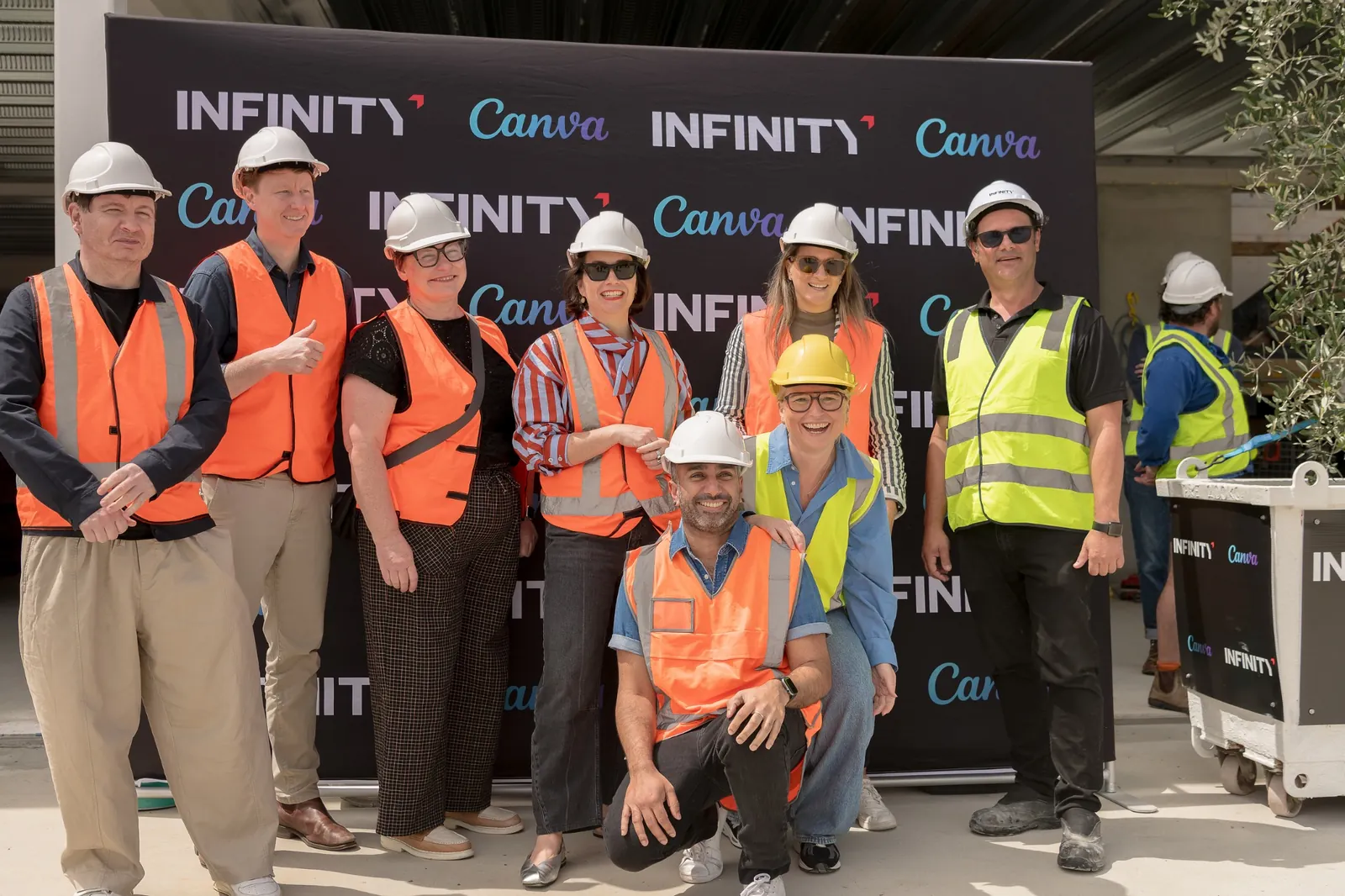 Guests gathered for a group photograph at the Canva Sydney Campus topping out ceremony