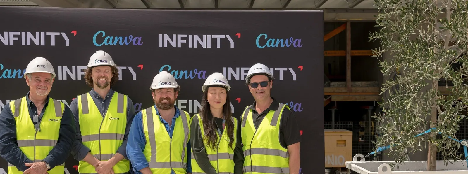 Infinity Constructions and Canva project representatives celebrating the Sydney Campus milestone