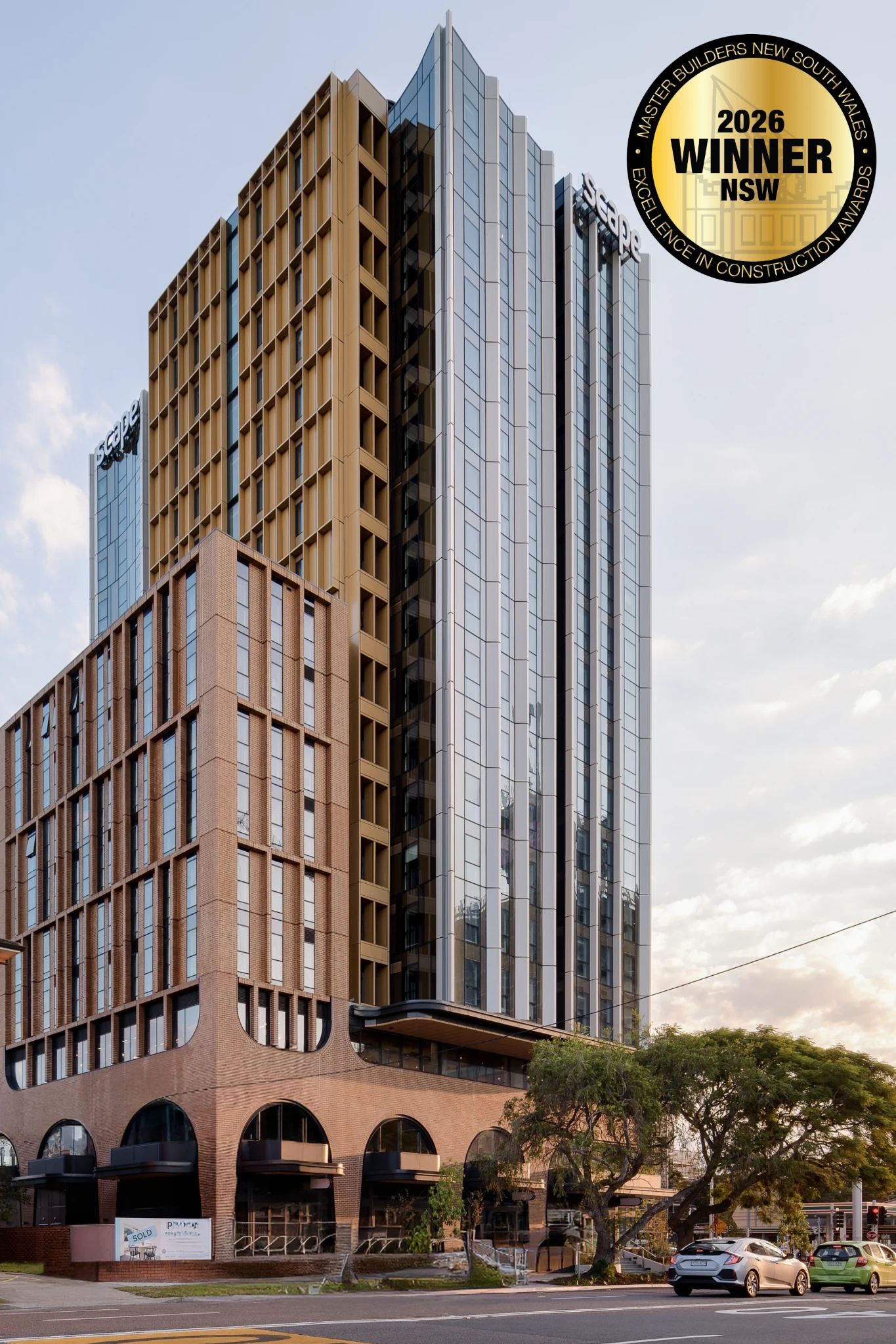 Scape Kensington student accommodation tower with 2026 Master Builders NSW award winner badge